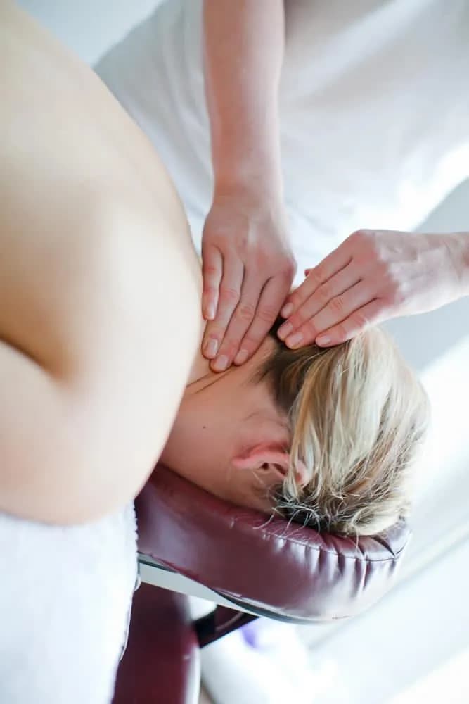 Client receiving an Indian head massage